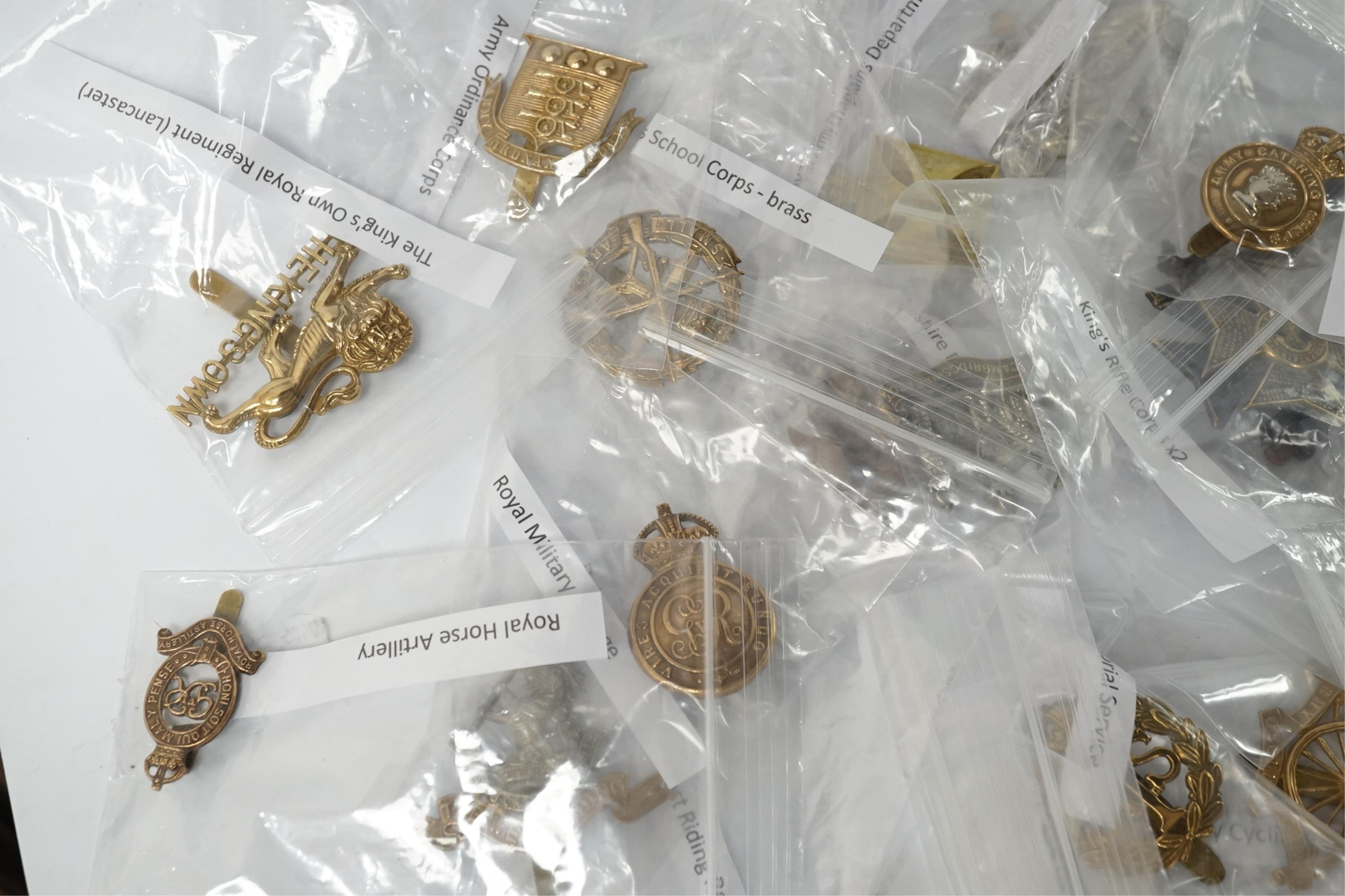 Fifty military cap badges, including; the Duke of Lancaster’s Own regiment, the Blues and Royals, Glider Pilot regiment, Sherwood Foresters regiment, Leicestershire regiment, Royal West Kent regiment, Inns of Court regim